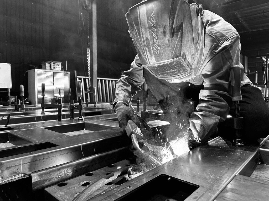 Welder building a custom scale deck in the SellEton USA shop