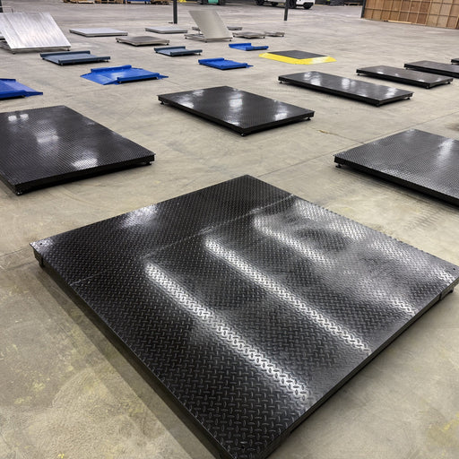 SellEton SL-700-NN industrial floor scales lined up in the SellEton warehouse